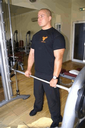 Biceps Barra Pronação Multipower - Execução